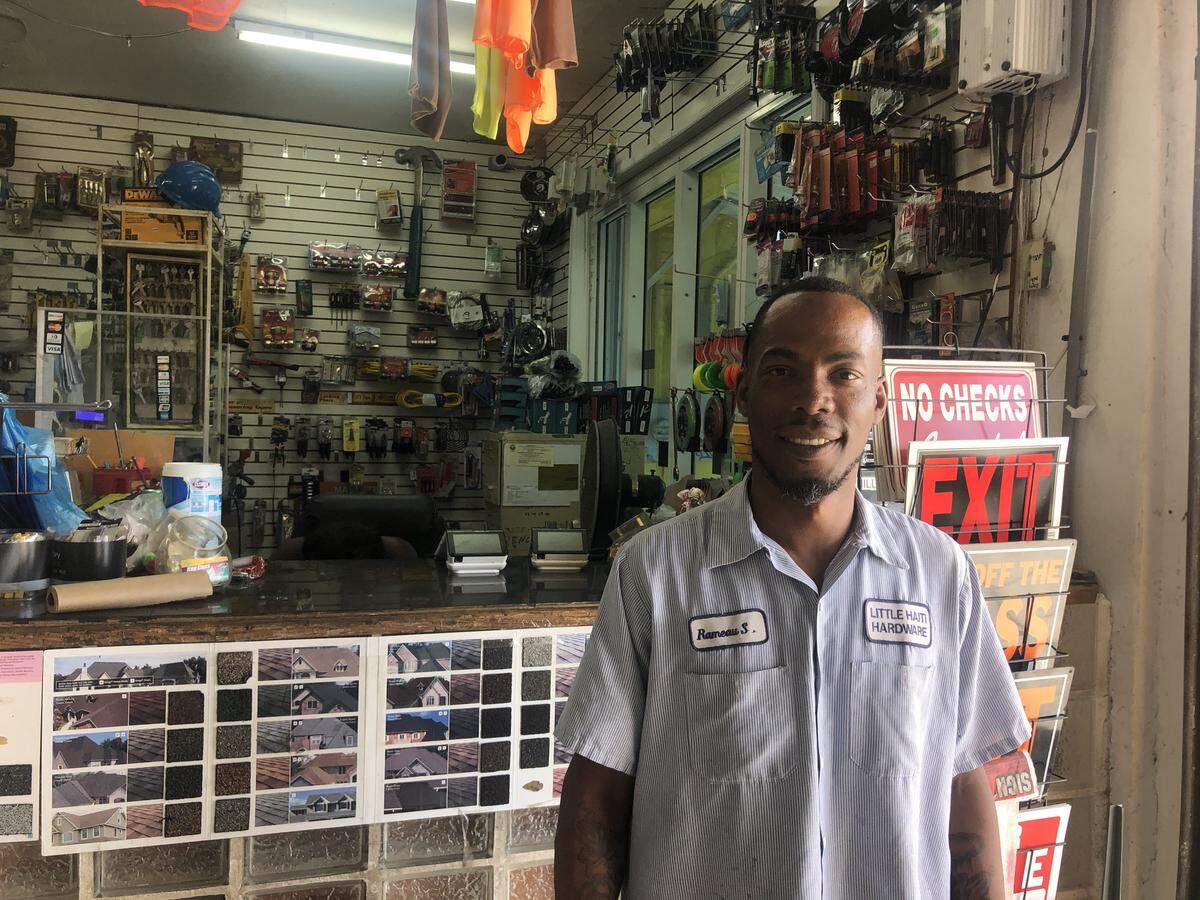 Scattini Remeau stands at the family-owned Little Haiti Hardware & Lumber on Tuesday March 17, 2020.