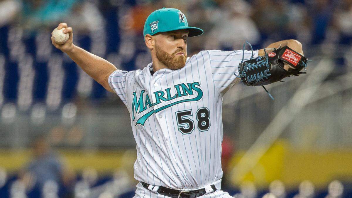 Miami Marlins starting pitcher Dan Straily (58) faces San Diego Padres center fielder Travis Jankowski (16) during the first inning of the game at Marlins Park in Miami on Saturday, June 9, 2018.