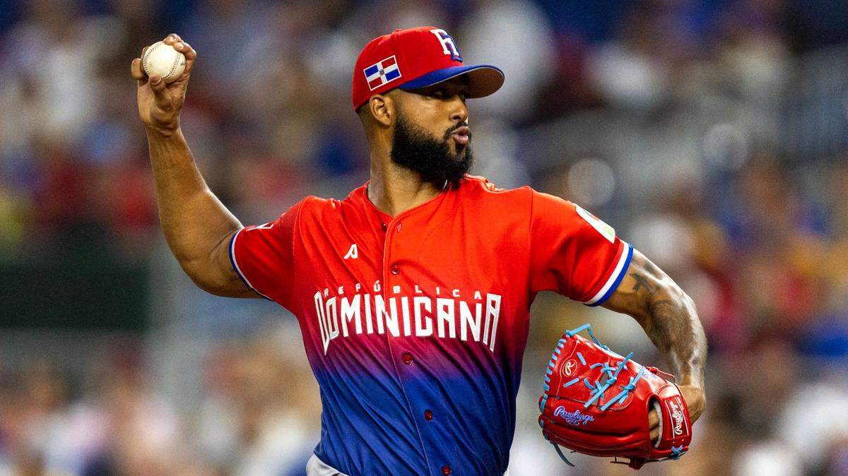 Dominican Republic pitcher Sandy Alcantara (20) throws the ball during the first inning of a 2023 World Baseball Classic game against Venezuela at loanDepot Park in Miami, Florida, on Saturday, March 11, 2023.