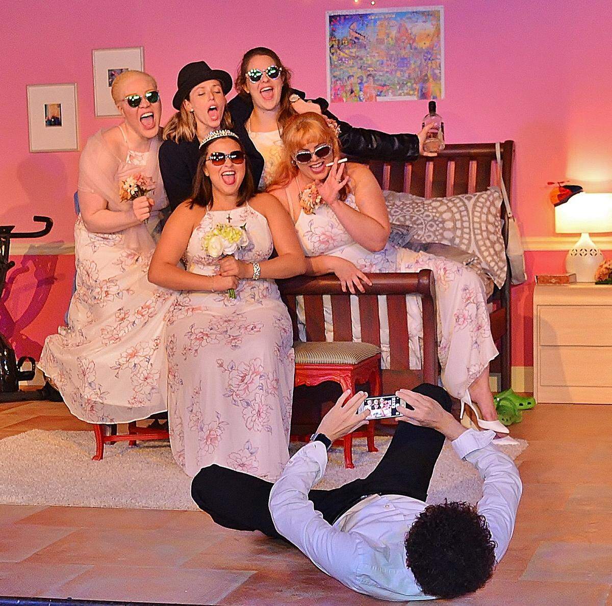 Kevin Rubi goes low for a photo of (clockwise, from top left) Thiana Berrick, Amanda-Lynn Williams, Lorena Estevez, Rei Capote and Icela Marliese in “Five Women Wearing the Same Dress.”