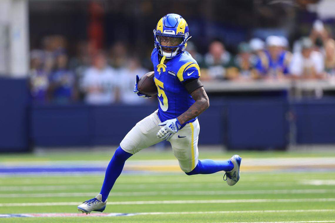 INGLEWOOD, CALIFORNIA - OCTOBER 06: Tutu Atwell #5 of the Los Angeles Rams returns a punt during the first half of a game against the Green Bay Packers at SoFi Stadium on October 06, 2024 in Inglewood, California. (Photo by Sean M. Haffey/Getty Images)