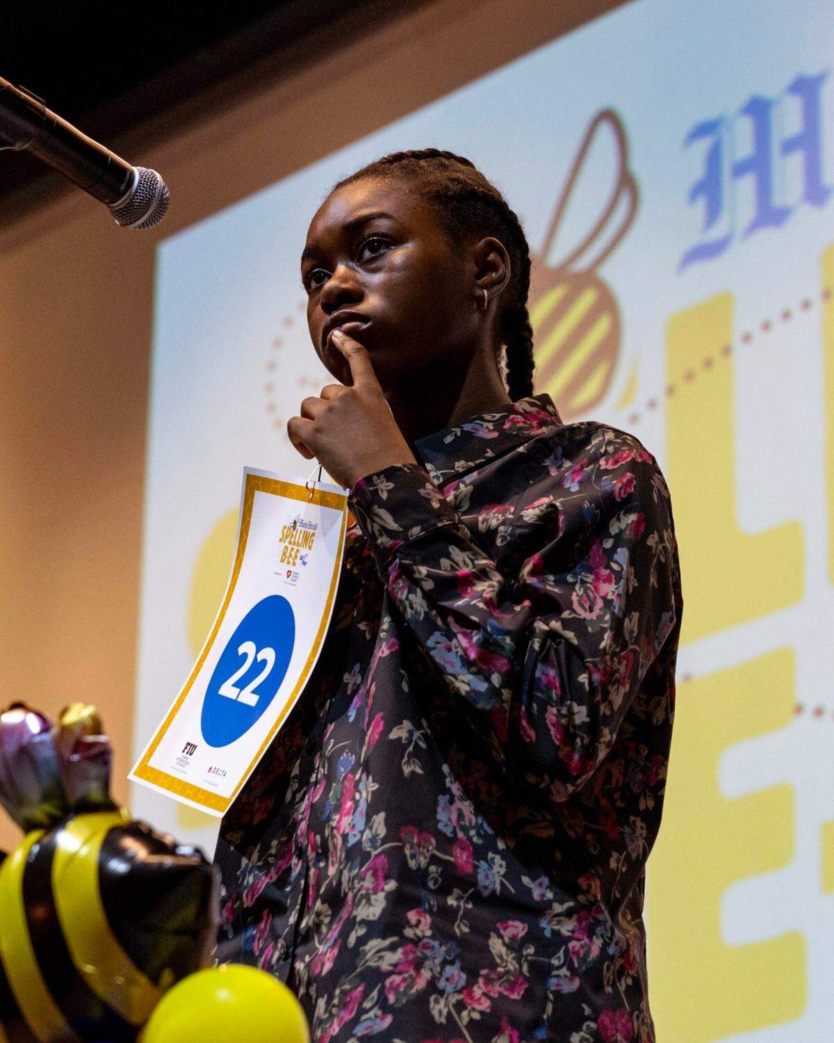 Seventh grader Dahana Destinoble from Sunrise Middle School spells during the 4th round of the Miami Herald Broward County Spelling Bee at NSU Art Museum in Fort Lauderdale, Florida on Thursday, March 7, 2024.