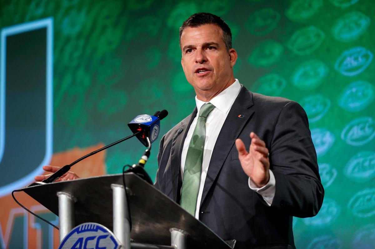 Miami head coach Mario Cristobal answers a question at the NCAA college football Atlantic Coast Conference Media Days in Charlotte, N.C., Thursday, July 21, 2022. (AP Photo/Nell Redmond)