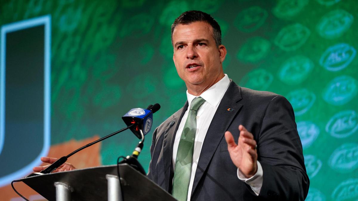 Miami head coach Mario Cristobal answers a question at the NCAA college football Atlantic Coast Conference Media Days in Charlotte, N.C., Thursday, July 21, 2022. (AP Photo/Nell Redmond)