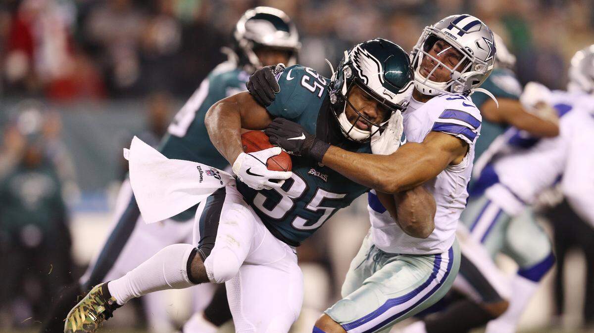 Byron Jones #31 of the Dallas Cowboys tackles Boston Scott #35 of the Philadelphia Eagles on a kickoff return during the fourth quarter in the game at Lincoln Financial Field on Dec. 22, 2019 in Philadelphia, Pa. (Patrick Smith/Getty Images/TNS)