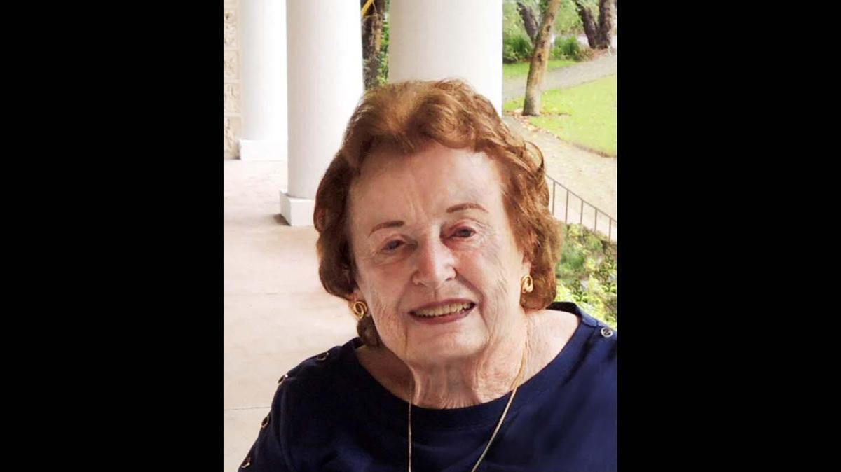 Preservationist Sallye Jude, who died at 96, photographed on the porch at the historic Coral Gables Merrick House.