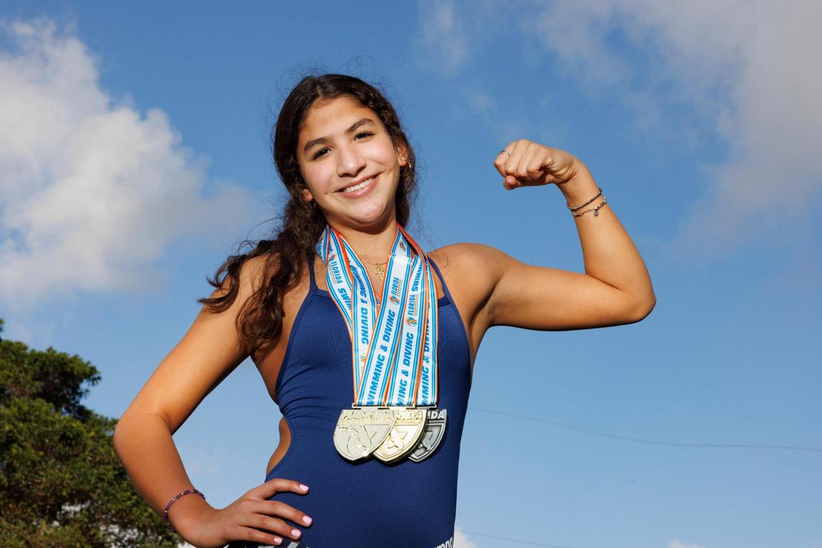 Jia Amores, freshman swimmer for Mater Lakes, poses for her All-Dade Player of the Year photo on Tuesday, Dec. 17, 2024, at AD Barnes Park in Miami.