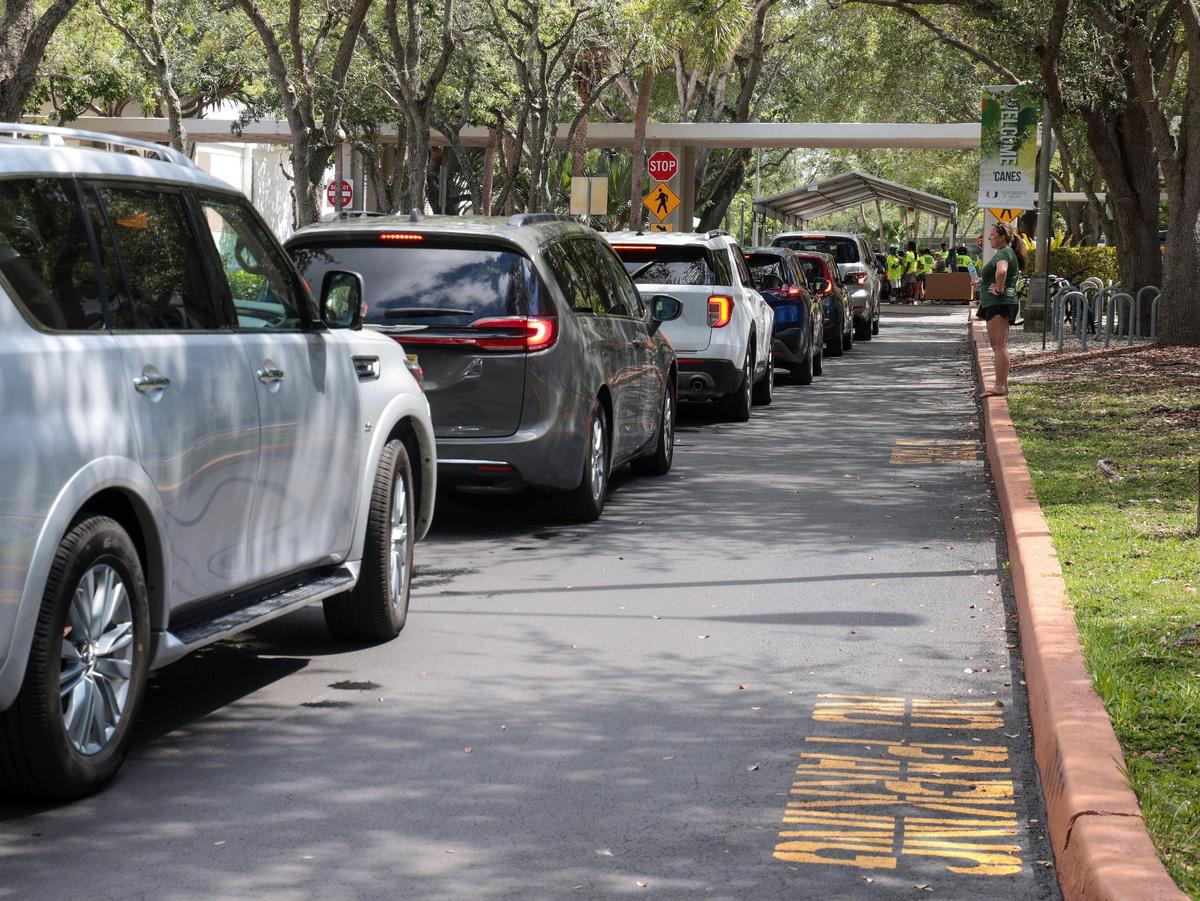 On Tuesday, Aug. 16, 2022, vehicles line up as out-of-state University of Miami freshmen move into the Mahoney and Pearson residential colleges at its Coral Gables campus.