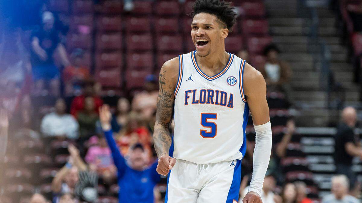 Florida Gators guard Will Richard (5) reacts after scoring a 3-point shot against the Richmond Spiders in the second half of their Orange Bowl Basketball Classic game at the Amerant Bank Arena on Saturday, Dec. 9, 2023, in Sunrise, Fla.