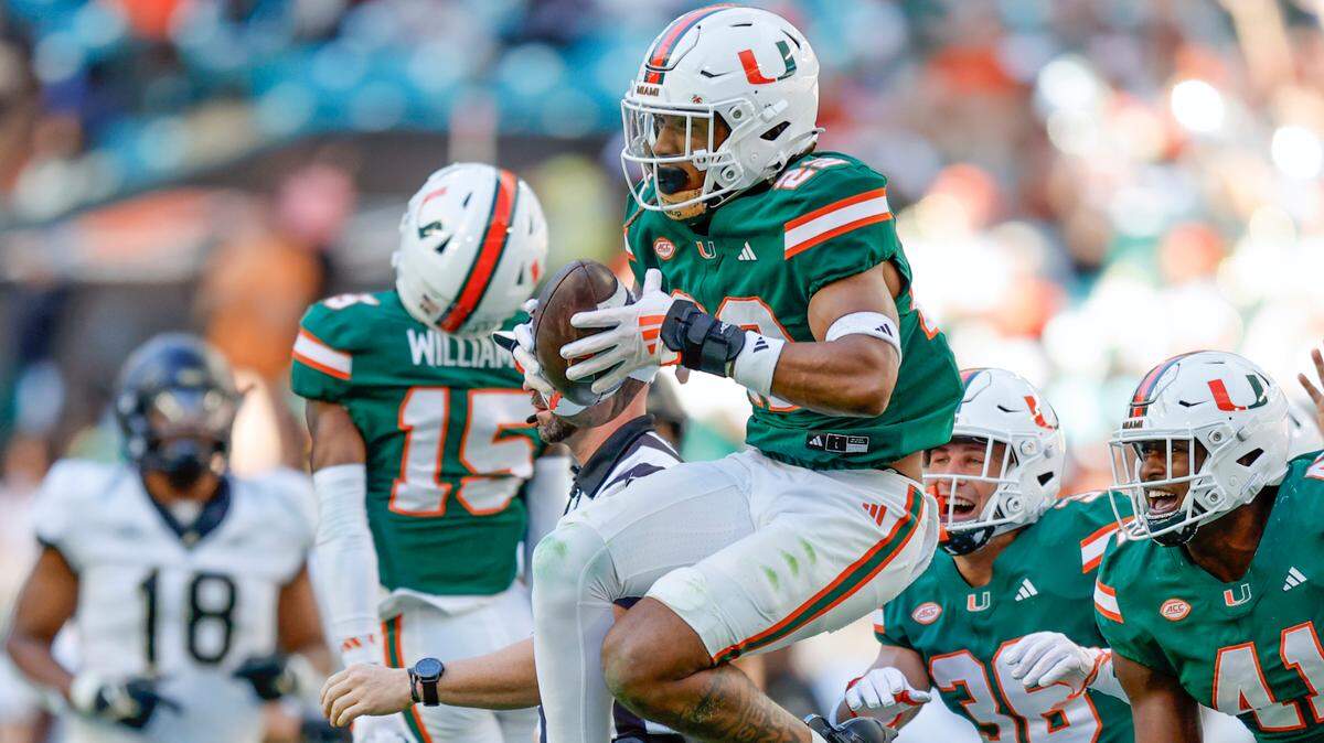 Miami Hurricanes linebacker Cam Pruitt (22) reacts after intercepting a Wake Forest Demon Deacons pass in the second half of their NCAA game in Miami Gardens, Florida, on Saturday, November 23, 2024.