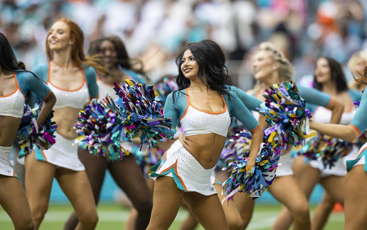 Miami Dolphins cheerleaders perform as their team plays against the Los Angeles Chargers in the first half of their NFL game at Hard Rock Stadium on Sunday, Oct. 12, 2025, in Miami Gardens, Fla.