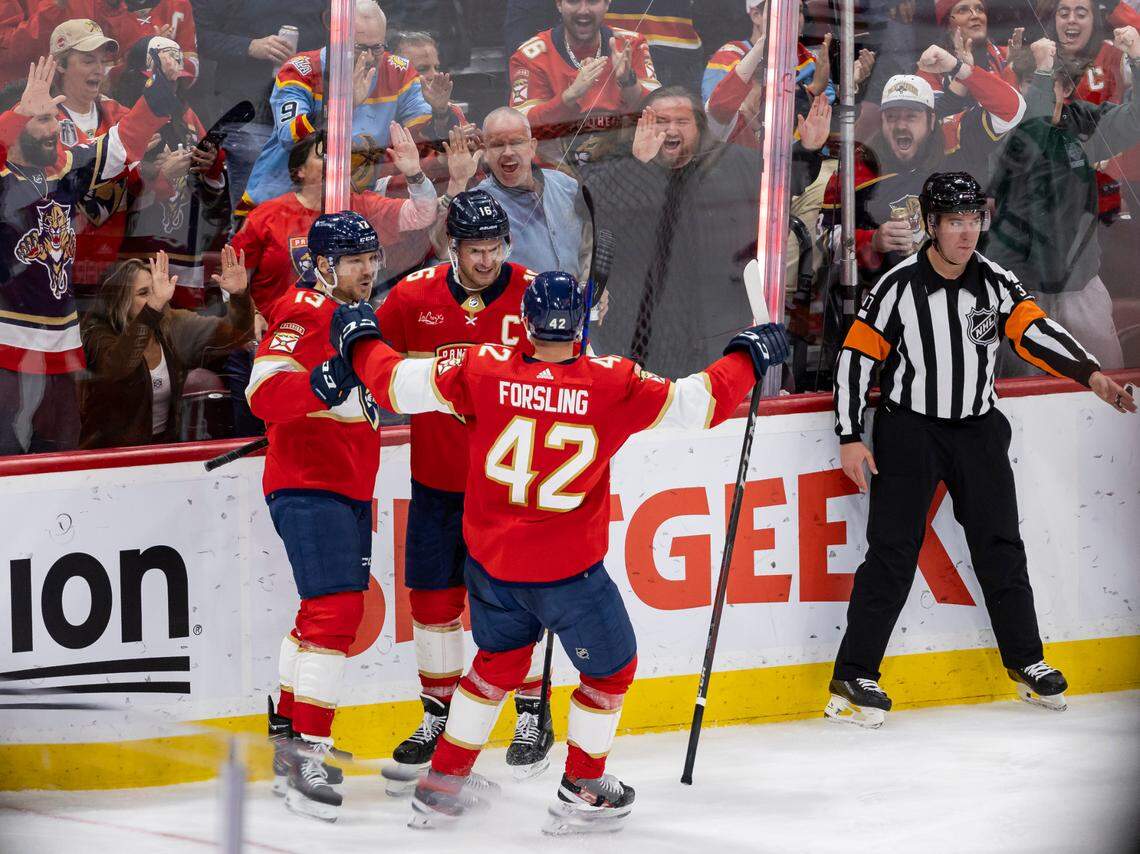 Florida Panthers center Aleksander Barkov (16) celebrates with his teammates after scoring a goal against the Dallas Stars in the third period of their NHL game at the Amerant Bank Arena on Wednesday, Dec. 6, 2023, in Sunrise, Fla.