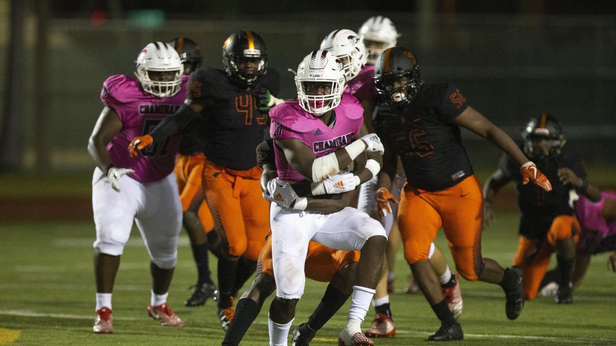 In this Oct. 12, 2018 file photo, Chaminade-Madonna College Preparatory running back Thaddius Franklin (11) runs the ball during the 4th quarter in a game against Booker T. Washington Senior High School at Curtis park.