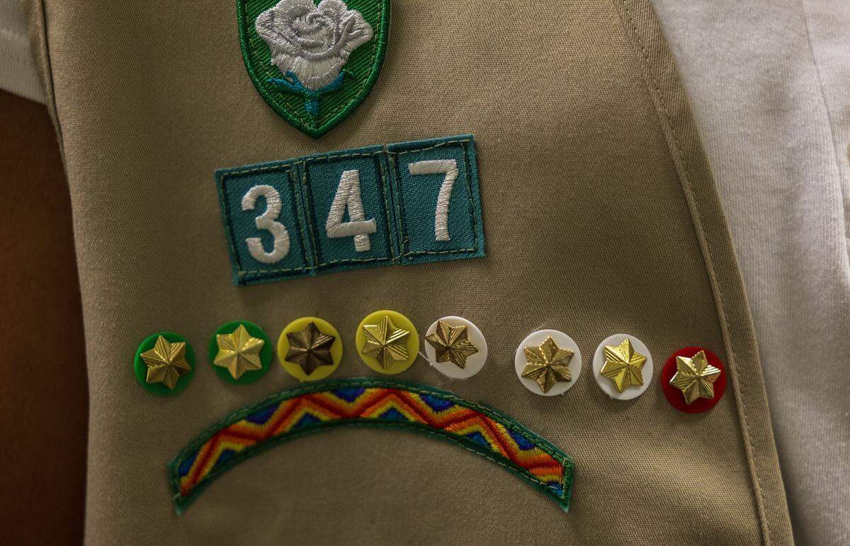 Details of a vest with badges won by Girl Scouts Troop 347 members by accomplishing many tasks that will help them in life, photographed at the Betty T. Ferguson Recreational Complex, in Miami Gardens on Tuesday, January 28, 2026.
