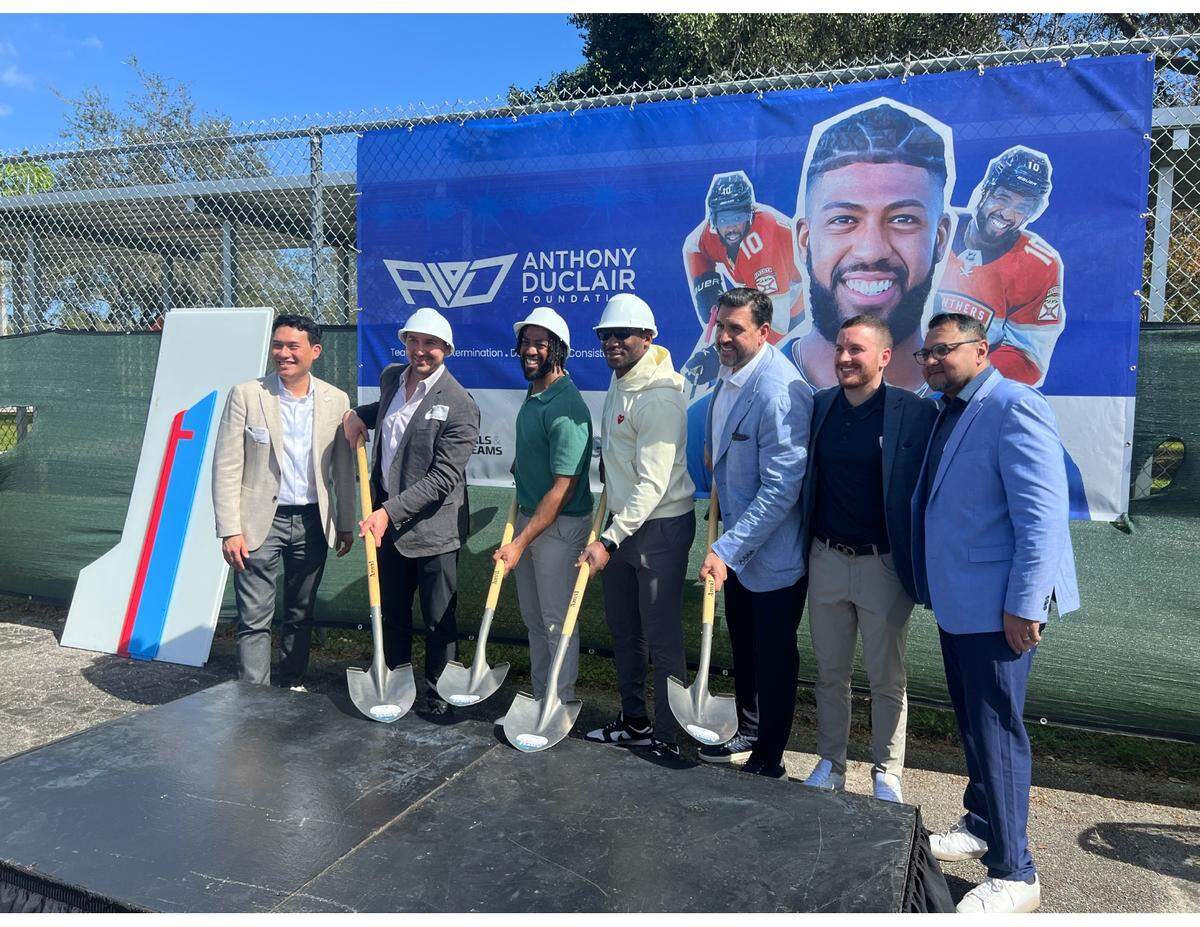 Former Florida Panthers forward Anthony Duclair (third from left) takes part in a groundbreaking ceremony for a synthetic ice rink at Boyd Anderson High in Lauderdale Lakes on Wednesday, Feb. 7, 2024.