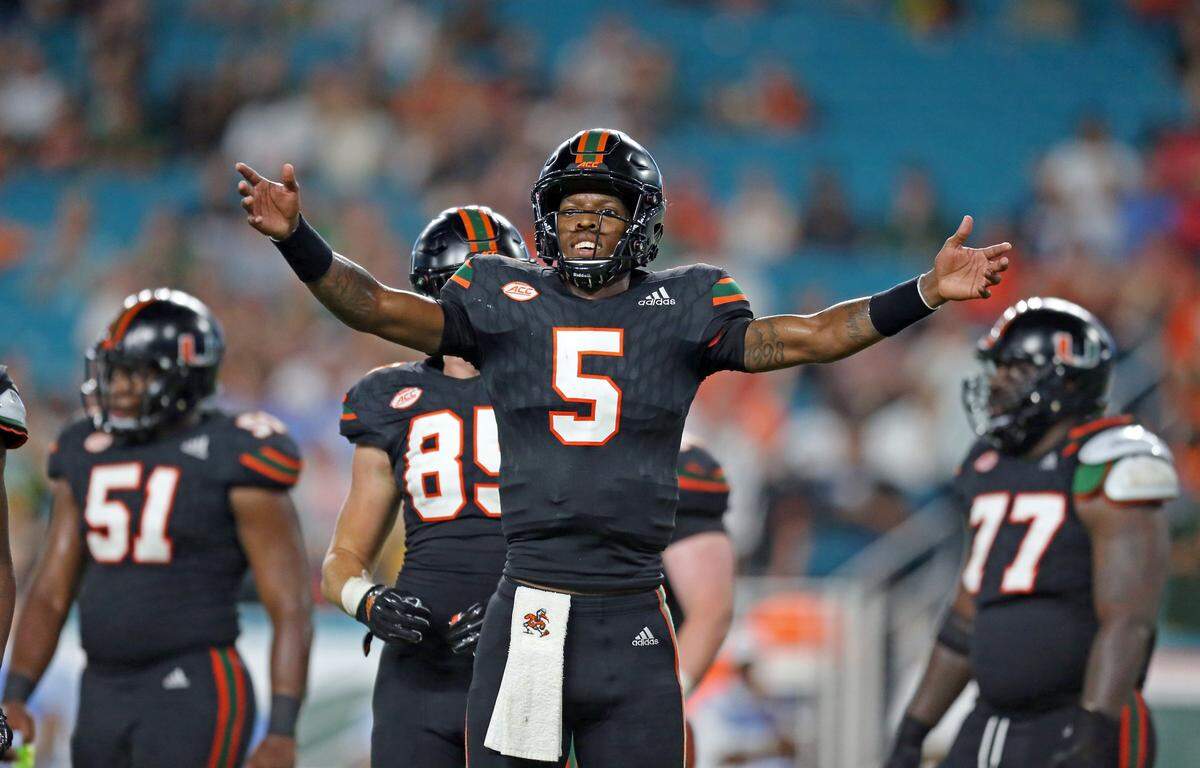 Miami Hurricanes quarterback N’Kosi Perry, shown in the North Carolina game, is starting again on Saturday at Virginia Tech.