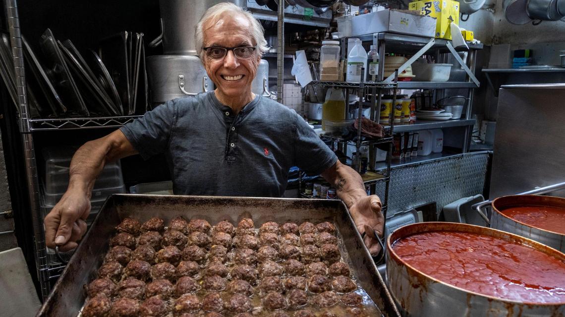 Roberto Auricchio, owner of Nunzio’s, with a tray of meatballs in the restaurant’s kitchen. After nearly 50 years of serving classic red sauce dishes to the western Miami suburbs, Nunzio’s Ristorante is closing.