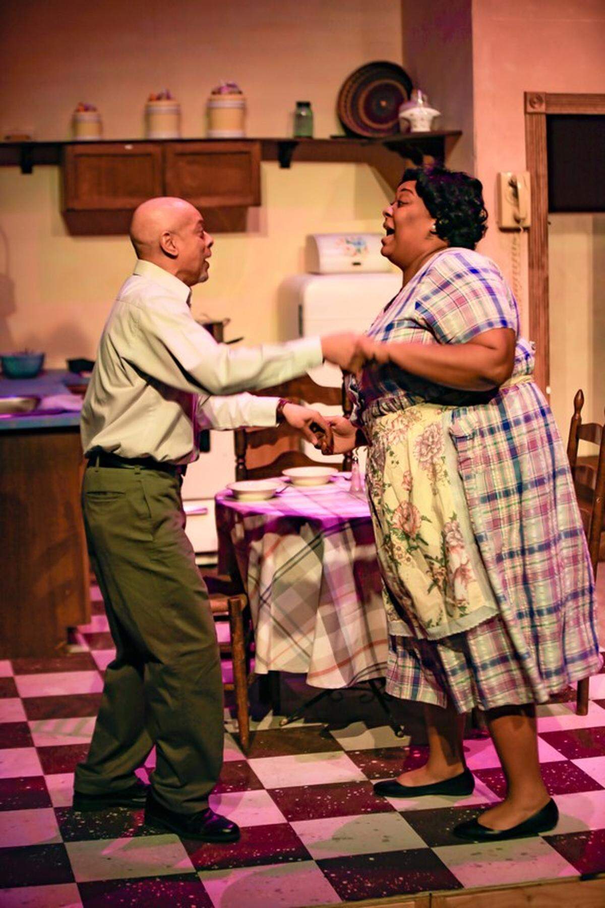 Gil Tucker and Brandiss Seward share a joyous dance in M Ensemble’s ‘Meet Me at the Oak.’
