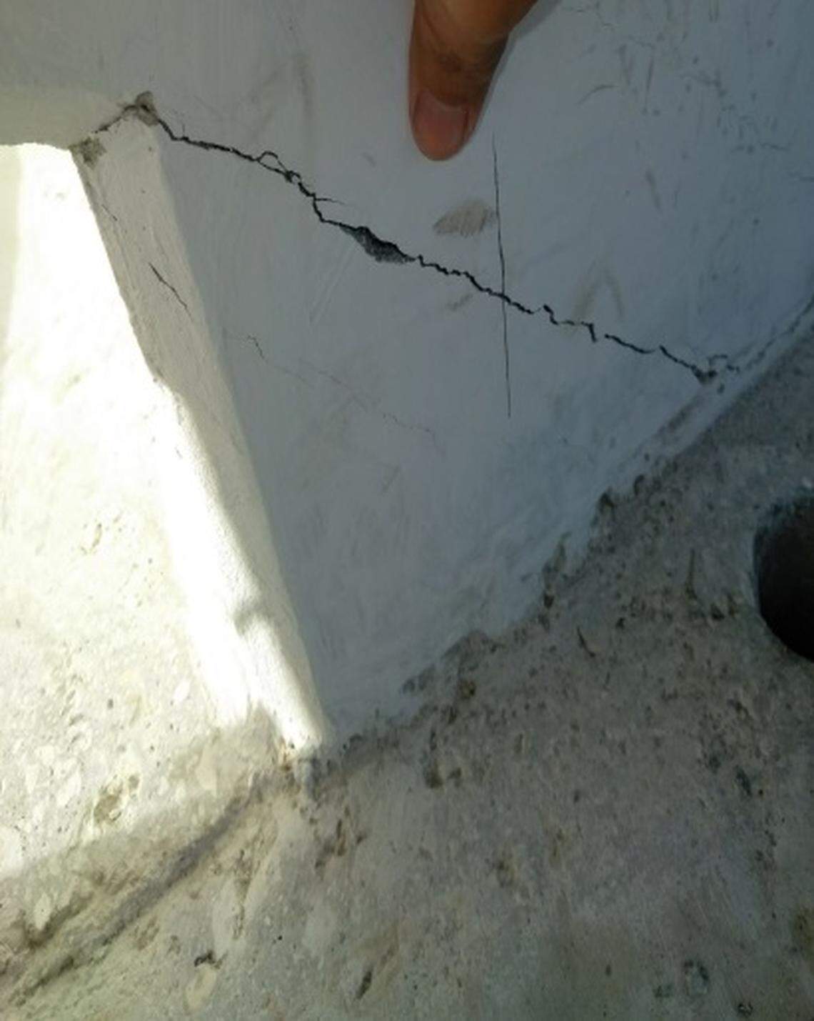 Cracks were reported in the Florida International University bridge days before it was raised into the air above busy Tamiami Trail.