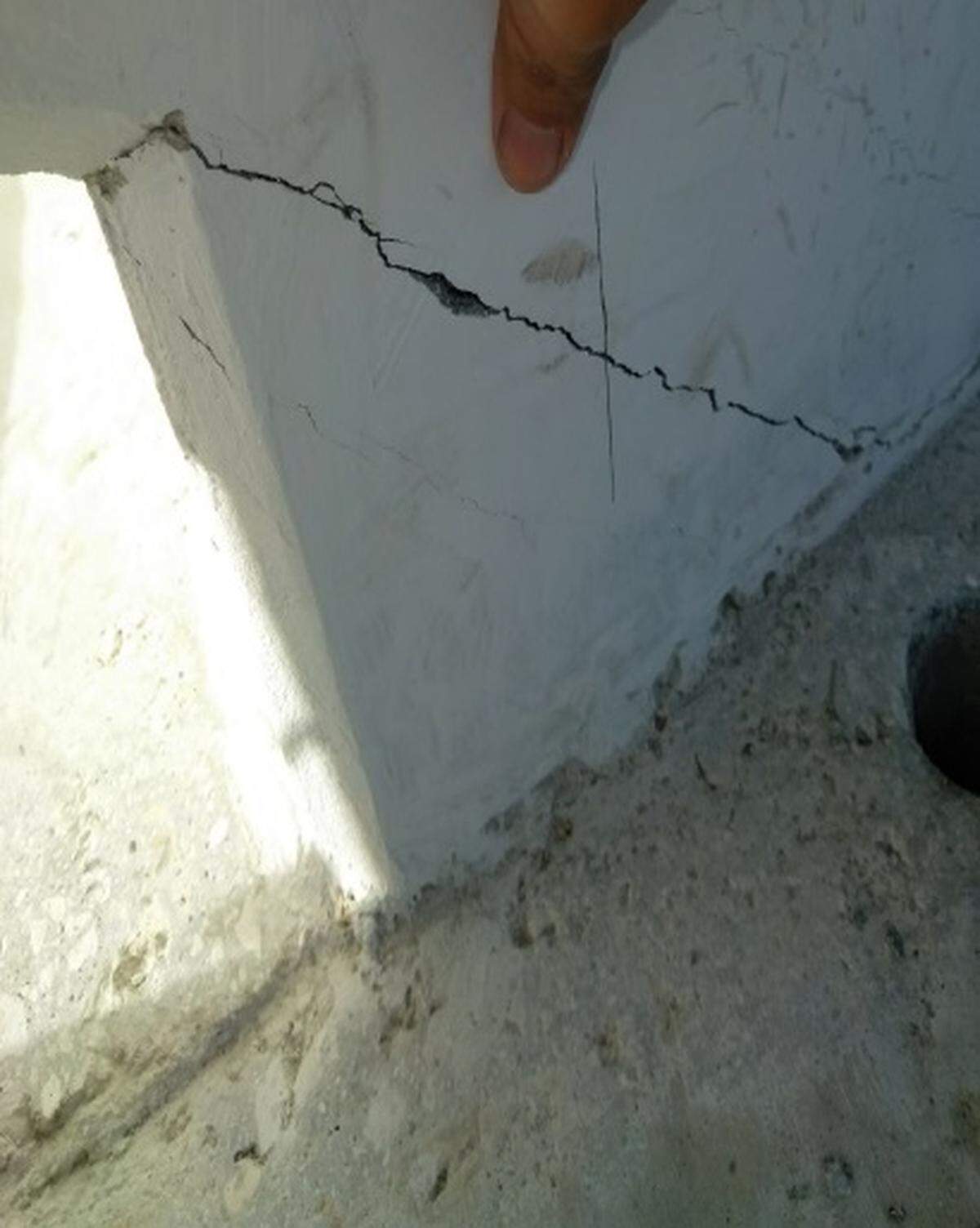 Cracks were reported in the Florida International University bridge days before it was raised into the air above busy Tamiami Trail.