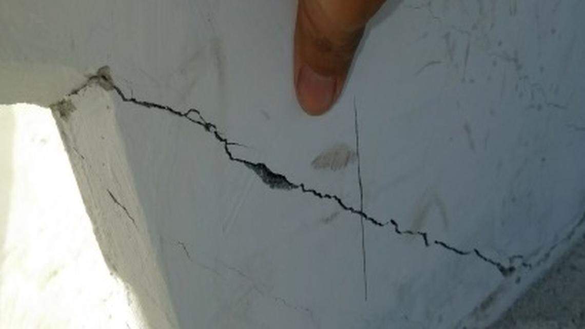 Cracks were reported in the Florida International University bridge days before it was raised into the air above busy Tamiami Trail.