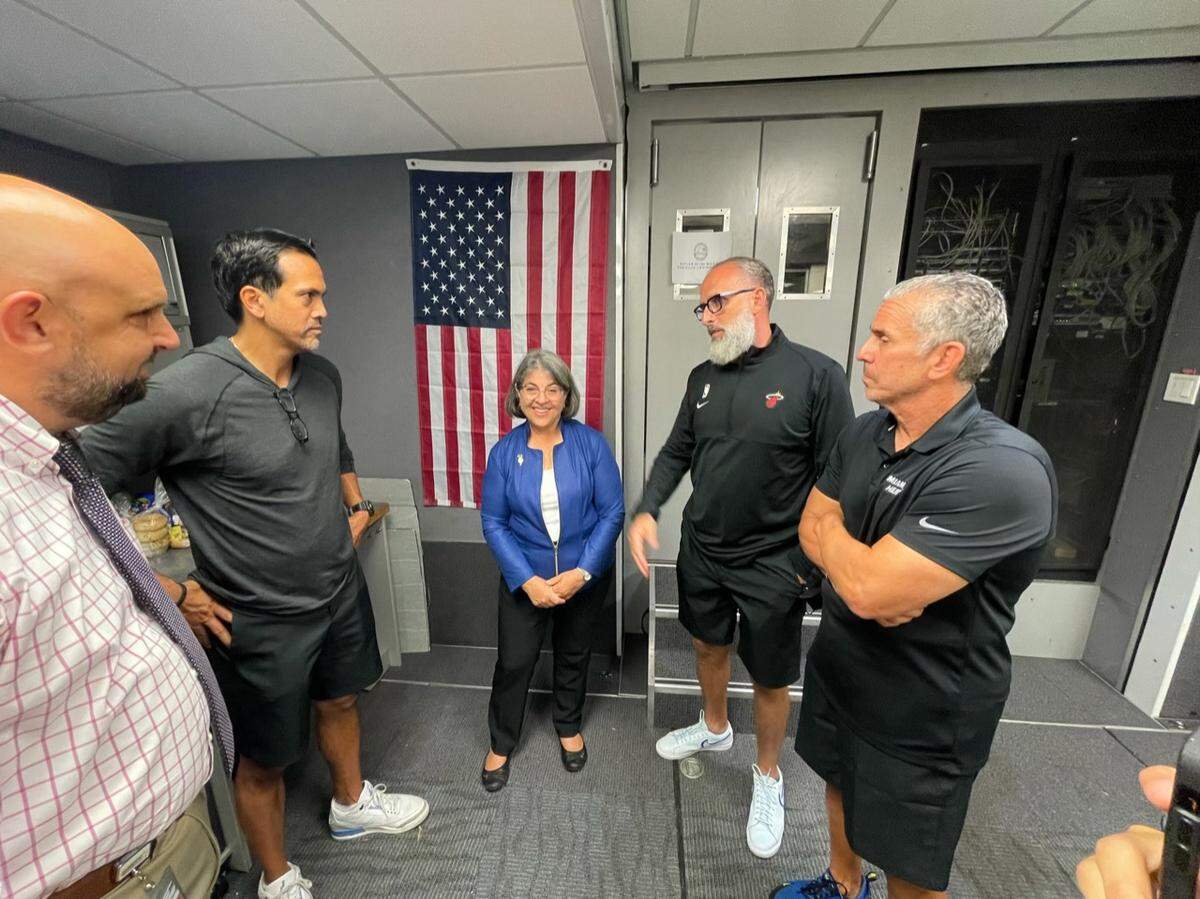 Miami Heat coach Erik Spoelstra, assistant coach Octavio De La Grana and Steve Stowe, the vice president and executive director of the Miami Heat Charitable Fund, meet with Miami-Dade Mayor Daniella Levine Cava this week near the site of the tragic collapse of the Champlain Towers South condo in Surfside.