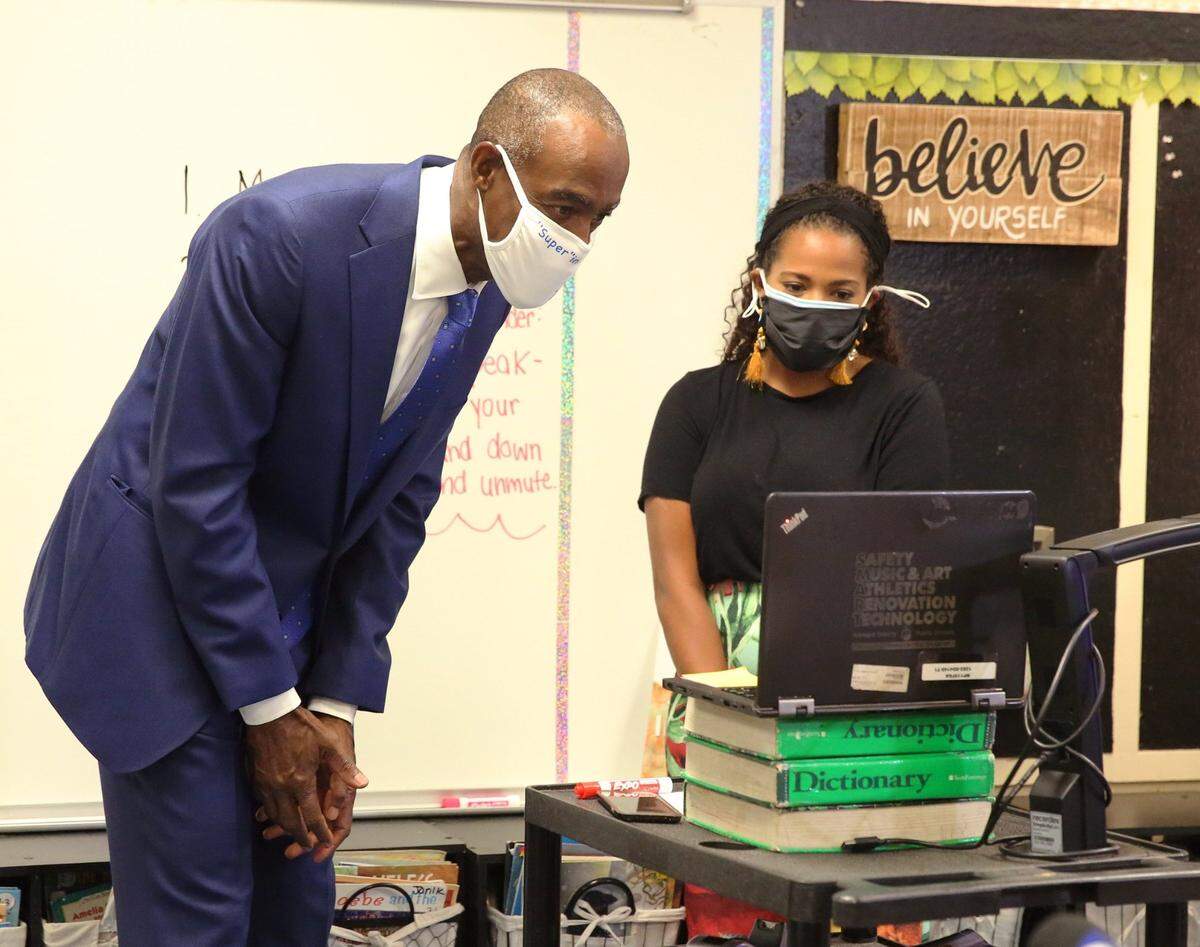 Broward Schools Superintendent Robert Runcie leans in toward teacher Skylar Billingsley’s laptop to say hello to her students at Nova Blanche Forman Elementary School in Davie during the first day of online learning Wednesday, Aug. 19, 2020. All Broward County public schools are teaching classes remotely because of COVID-19.