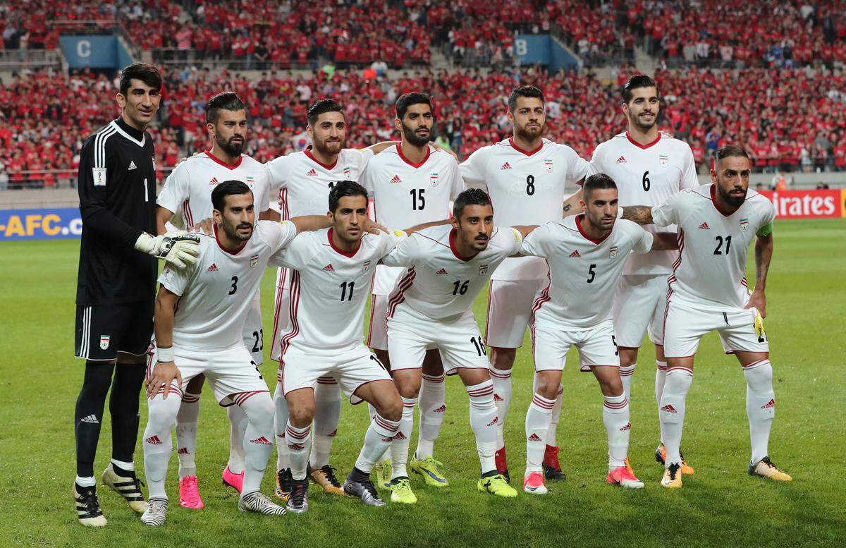 In this photo taken on Thursday, Aug. 31, 2017, Iran's team players, back row from left, Alireza Beiranvand, Ramin Rezaeian, Alireza Jahanbakhsh, Mohammad Ansari, Morteza Pouraliganji, Saeid Ezatolahi and front row from left, Ehsan Hajsafi, Vahid Amiri, Reza Ghoochannejhad, Milad Mohammadi, Ashkan Dejagah pose for the team photo before the 2018 Russia World Cup Group A qualifying soccer match against South Korea at Seoul World Cup Stadium in Seoul, South Korea. (AP Photo/Lee Jin-man)