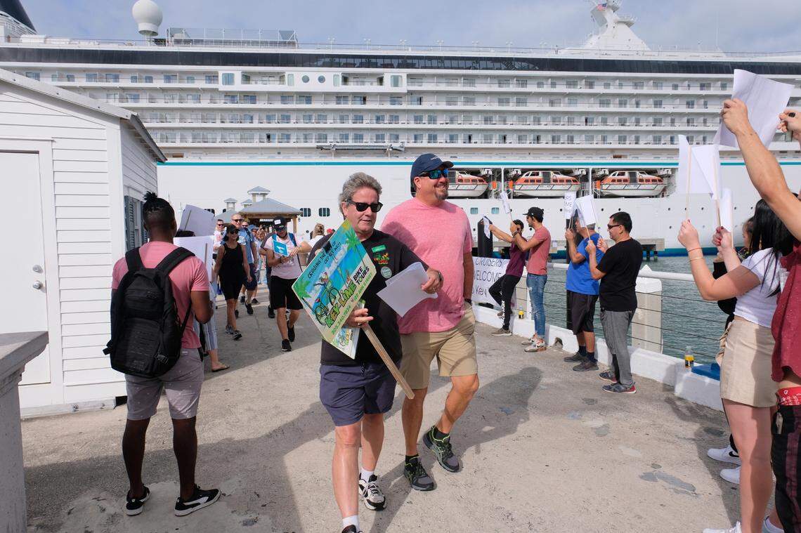On Nov. 28, 2021, cruise ship passengers were welcomed to Key West by employees of local businesses who were dispatched to the piers with welcome signs.