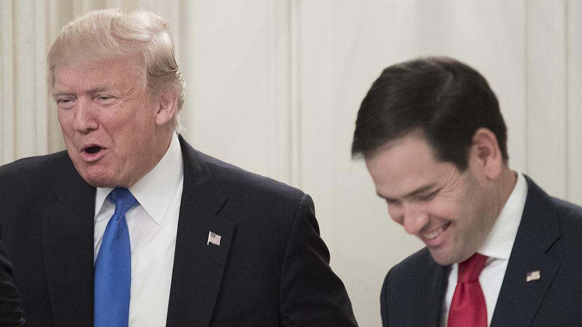 In this 2017 file photo, President Donald Trump, center, shakes hands with Republican Sen. John Barrasso of Wyoming, left, beside Republican Sen. Marco Rubio of Florida at a lunch with members of Congress where Trump delivered remarks on health care and Republicans’ inability thus far to replace or repeal the Affordable Care Act. The lunch was in the State Dining Room of the White House on July 19, 2017, in Washington, DC. (Photo by Michael Reynolds - Pool/Getty Images)