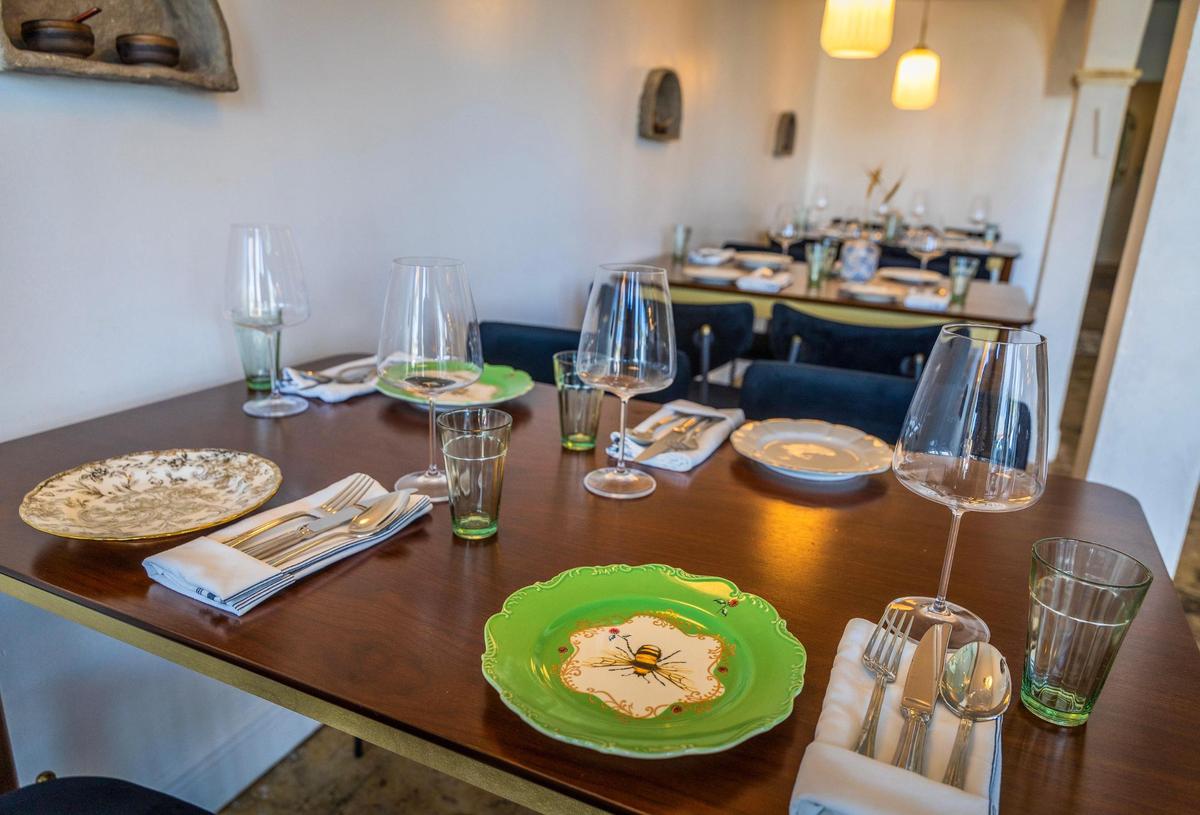 The miss-matched place settings at Mutra, an Israeli restaurant in North Miami.