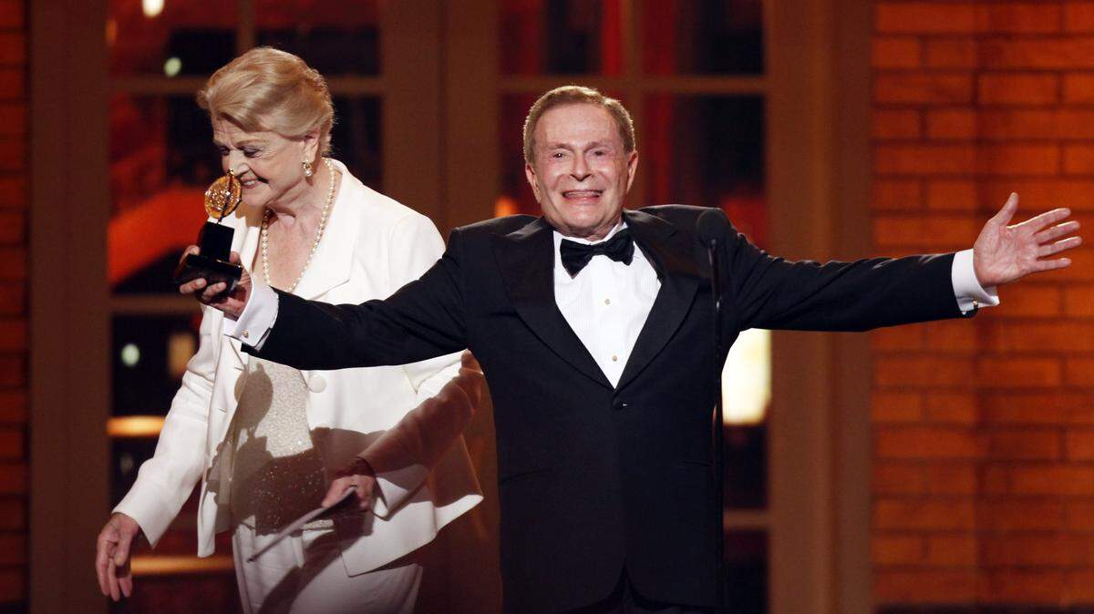 Jerry Herman accepts his Special Tony Award for Lifetime Achievement in the Theater from Angela Lansbury at the 63rd Annual Tony Awards in New York in 2009. Herman, the award winning composer who wrote the cheerful, good-natured music and lyrics for such classic shows as “Mame,” “Hello, Dolly!” and “La Cage aux Folles,” has died. He was 88.