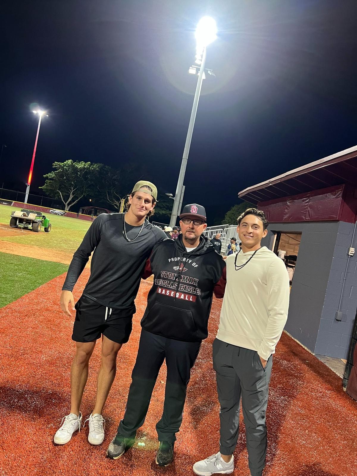 From left to right, Roman Anthony, Stoneman Douglas High baseball coach Todd Fitz-Gerald and Boston Red Sox prospect Marcelo Meyer
