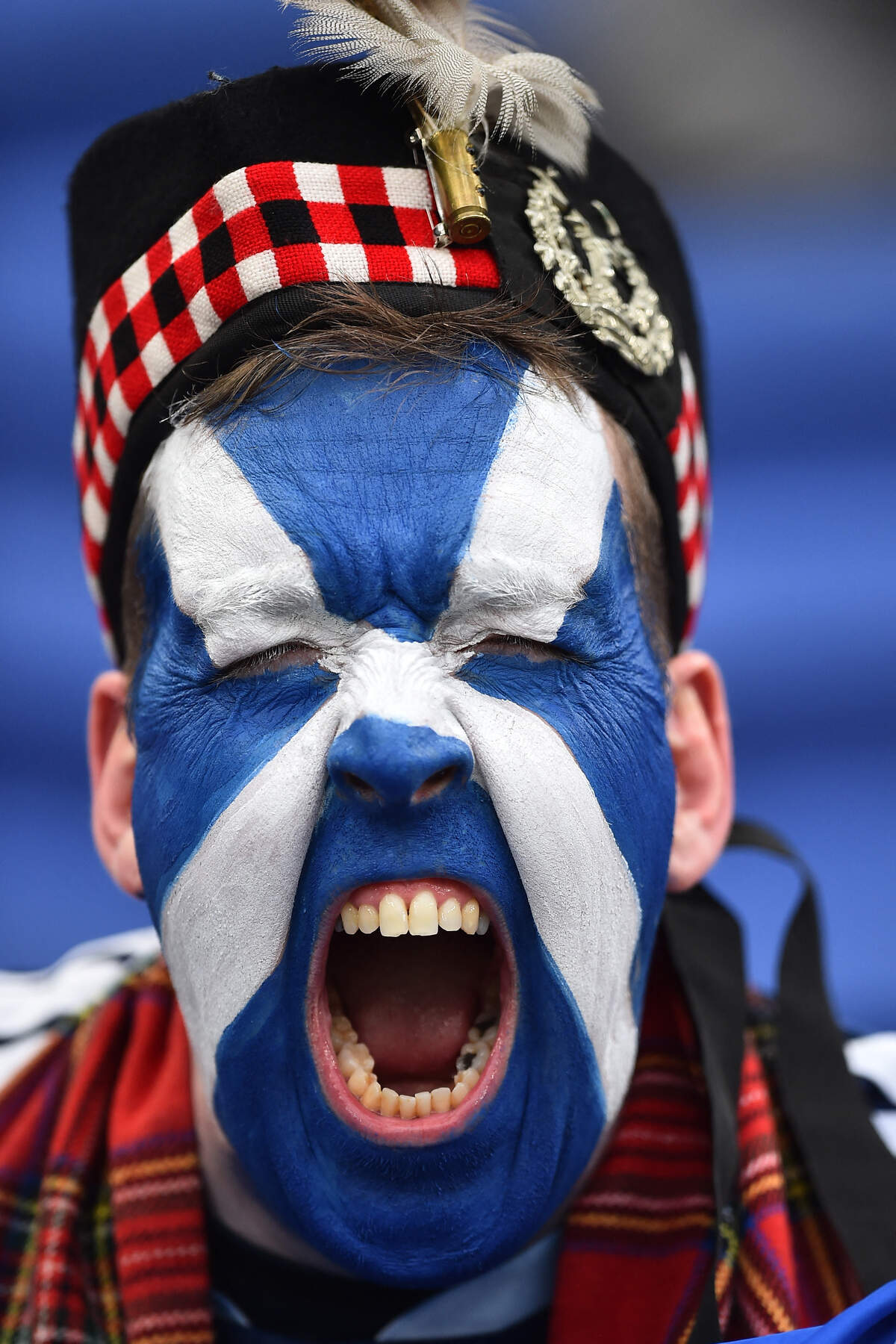 A member of the Tartan Army poses for a picture ahead of the friendly international football match between Scotland and Ivory Coast at the Hill Dickinson Stadium in Liverpool, north west England on March 31, 2026.  (Photo by PETER POWELL / AFP via Getty Images)