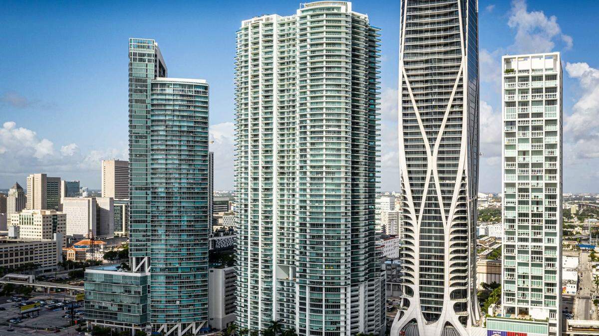 900 Biscayne Bay is the rectangular-shaped building in the middle of a row of condo towers on Miami’s waterfront (LoopNet).