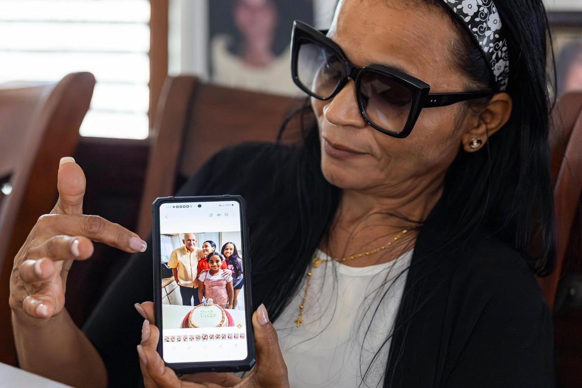 Marisol Sánchez, 55, holds a photo of her husband as she talks about her time living at the Li’l Abner Mobile Home Park on Friday, March 7, 2025, in Sweetwater, Florida.