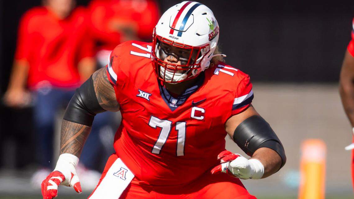 Oct 19, 2024; Tucson, Arizona, USA; Arizona Wildcats offensive lineman Jonah Savaiinaea (71) against the Colorado Buffalos at Arizona Stadium. Mandatory Credit: Mark J. Rebilas-Imagn Images