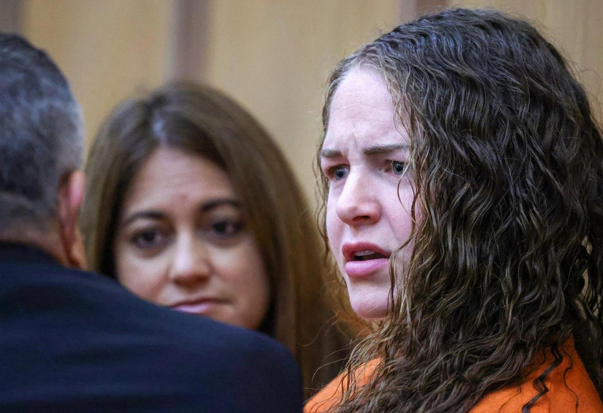 OnlyFans model and murder defendant, Courtney Clenney, right, is seated with her defense team as she appeared in court while her defense lawyer argued that the Miami-Dade States Attorney’s Office should be disqualified following the exit of the lead prosecutor inside Courtroom 2-5 at the Richard E. Gerstein Justice Building on Thursday, May 22, 2025 in Miami, Florida.