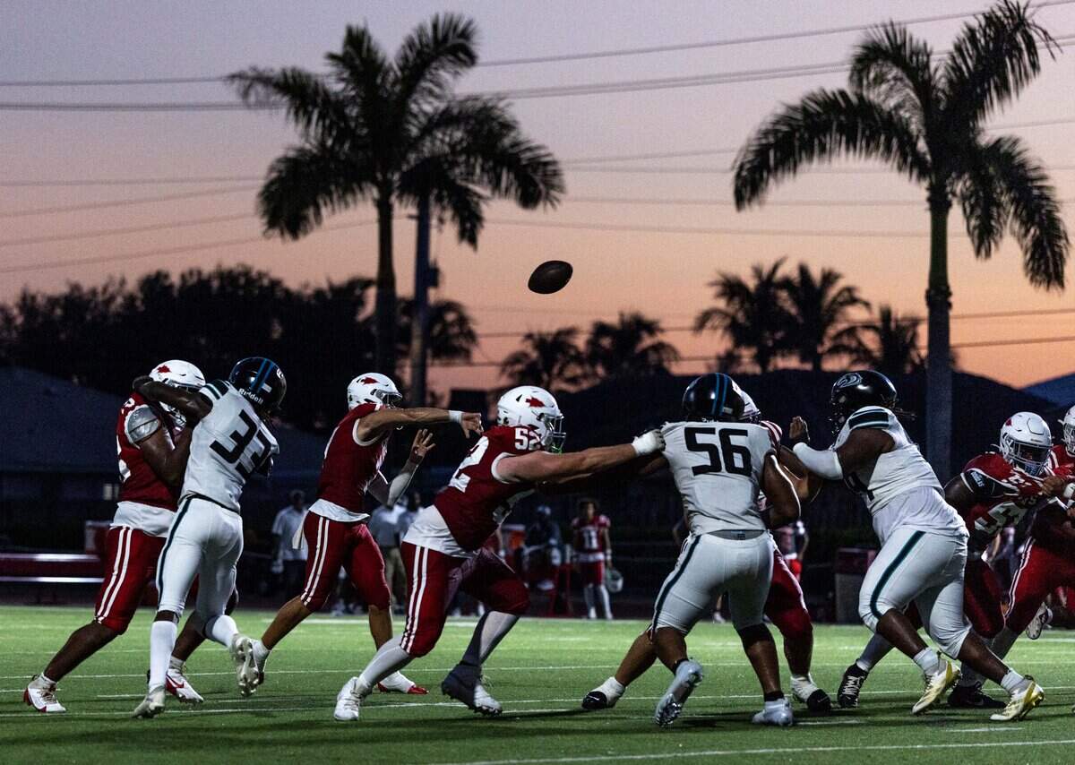 Cardinal Gibbons quarterback Jayden Torres (7) throws the ball during a football game against Archbishop McCarthy at Cardinal Gibbons High School on Thursday, August 21, 2025, in Miami, Fla.