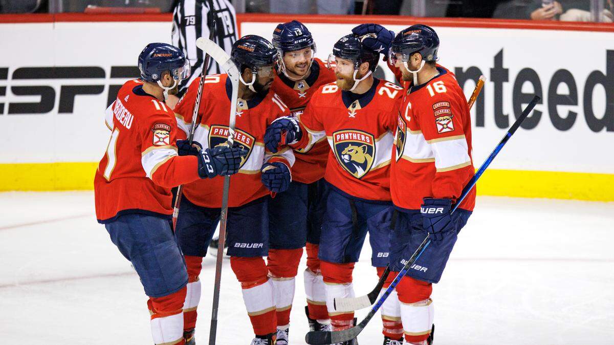 Florida Panthers center Sam Reinhart (13) celebrates with teammates Jonathan Huberdeau (11) Anthony Duclair (10) Claude Giroux (28) and Aleksander Barkov (16) after scoring his second goal against the Tampa Bay Lightning during the third period of an NHL game at the FLA Live Arena on Sunday, April 24, 2022 in Sunrise, Fl.