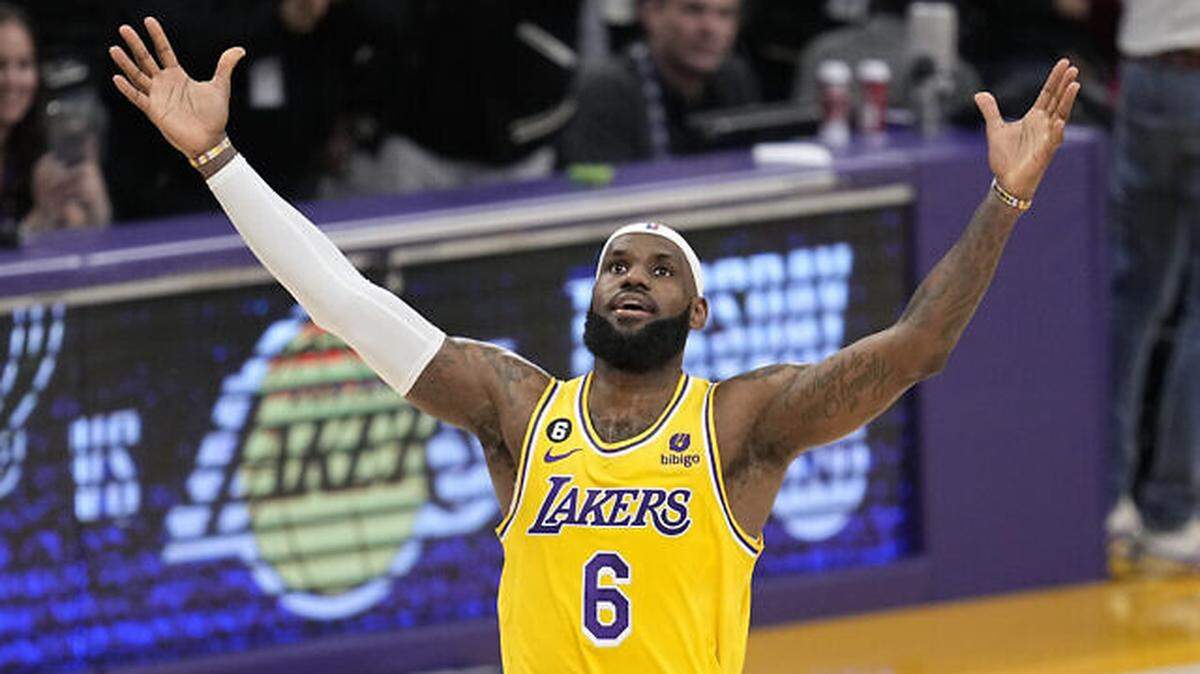 Los Angeles Lakers forward LeBron James celebrates after scoring to pass Kareem Abdul-Jabbar to become the NBA’s all-time leading scorer during the second half of an NBA basketball game against the Oklahoma City Thunder Tuesday, Feb. 7, 2023, in Los Angeles. (AP Photo/Mark J. Terrill)