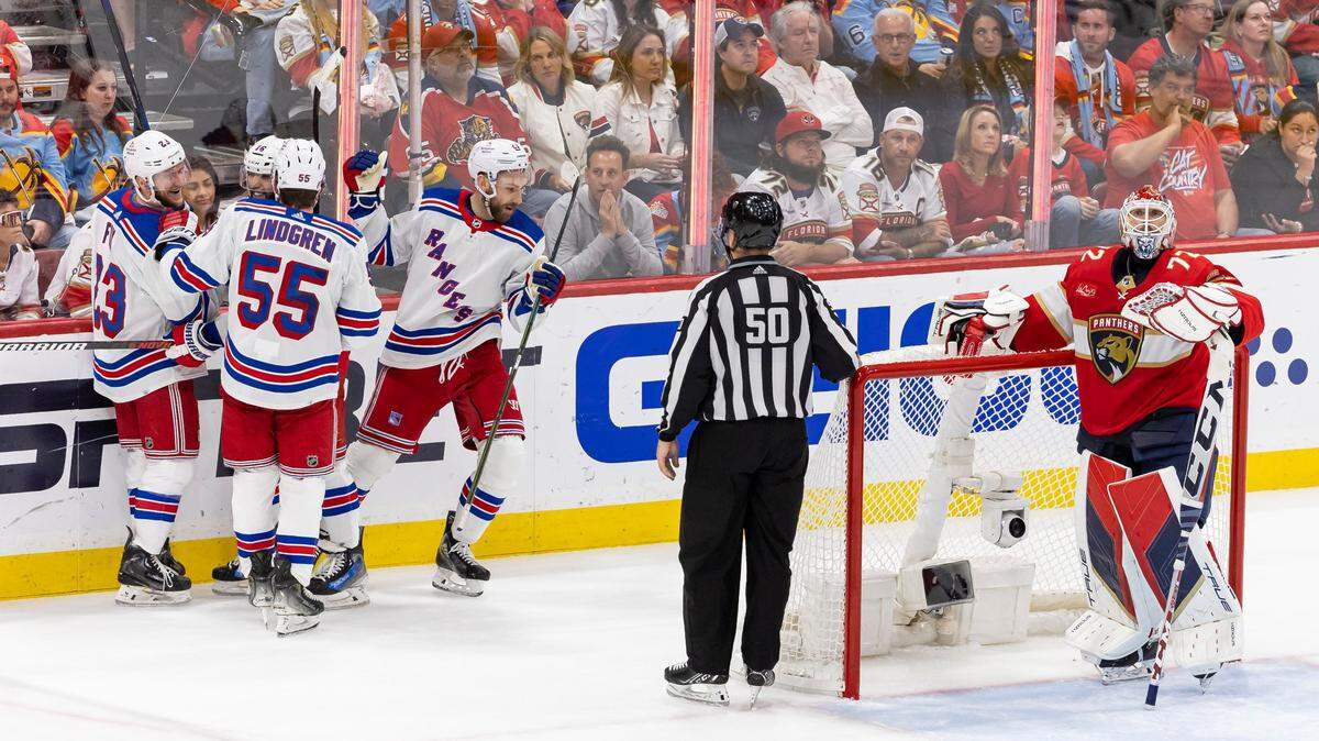 Florida Panthers goaltender Sergei Bobrovsky (72) reacts as New York Rangers center Barclay Goodrow (21) celebrates with his teammates after scoring a goal in the second period of Game 3 during the Eastern Conference finals of the NHL hockey Stanley Cup playoffs at the Amerant Bank Arena on Sunday, May 26, 2024, in Sunrise, Fla.