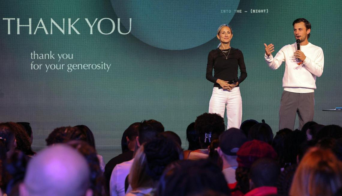 Pastors DawnCheré Wilkerson and Dakota Duron address the VOUS congregation in Miami Gardens on Palm Sunday. Established in 2015, VOUS is one of the most popular churches in Miami, especially with younger crowds.