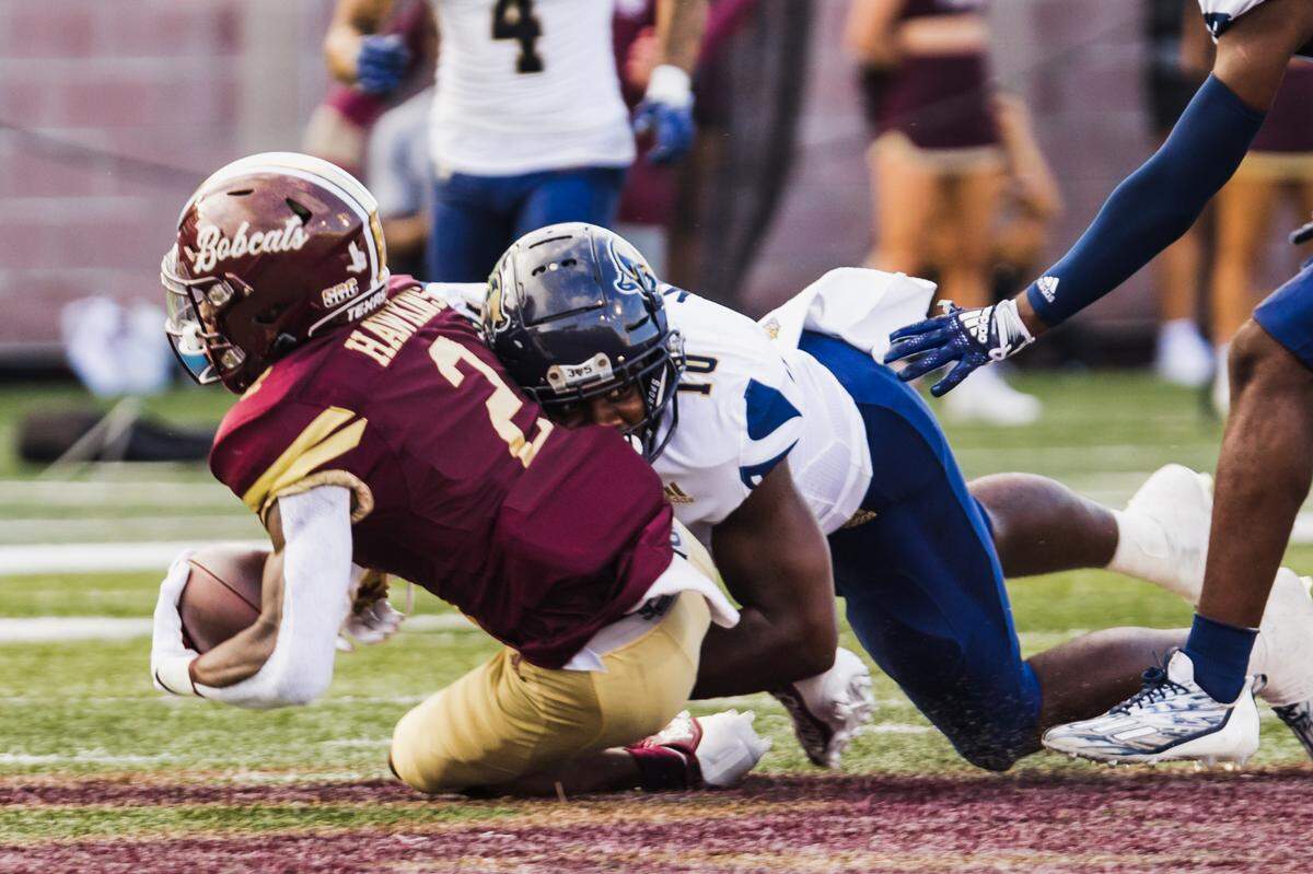 FIU linebacker Donovan Manuel brings down Texas State wide receiver Ashtyn Hawkins during a play from last Saturday’s game at Texas State. The Panthers fell 41-12.