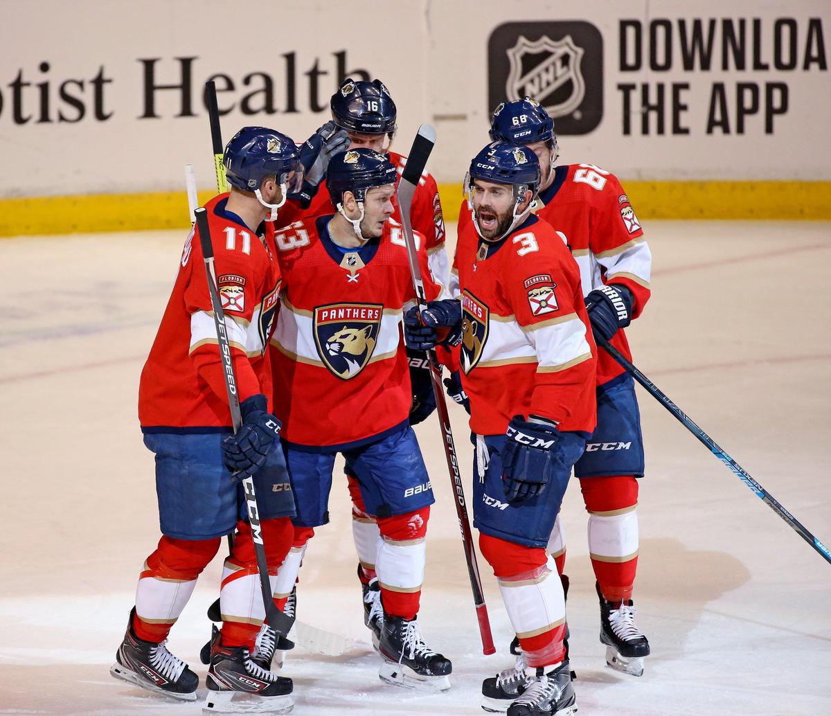 Florida Panthers right wing Evgenii Dadonov (63) is congratulated by teammates after scoring during the first period&nbsp;of an NHL regular season hockey game against the Los Angeles Kings at the BB&T Center on Thursday, January 16, 2020 in Sunrise.