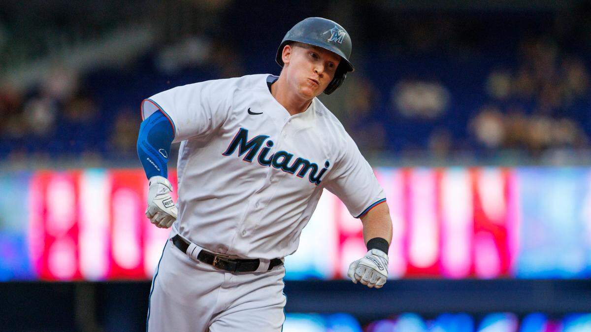 Miami Marlins designated hitter Garrett Cooper (26) reacts after hitting a two run home run during the third inning of a baseball game against the Colorado Rockies at LoanDepot Park on Wednesday, June 22, 2022 in Miami, Florida.