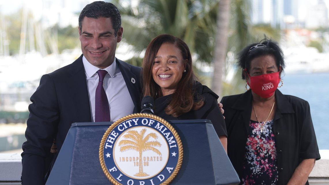 Newly elected Commissioner Christine King stands shoulder-to-shoulder with Mayor Francis Suarez after they were both sworn on Wednesday, Nov. 10, 2021 at City Hall. King represents Miami’s District 5, which includes Overtown, Wynwood, Liberty City, Little Haiti and the Upper Eastside. Left to Right: Mayor Suarez, Commissioner King, and her mother, Zezan Leggett.