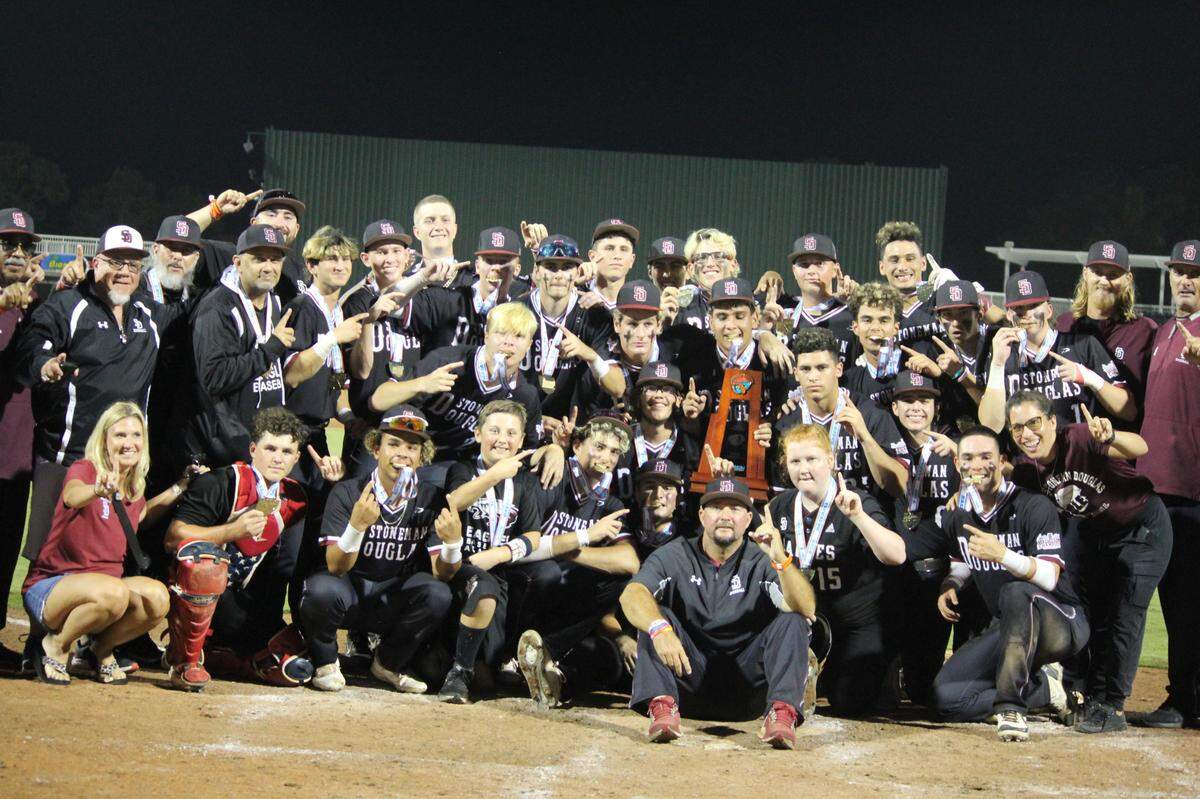 Stoneman Douglas baseball players celebrate after winning their second consecutive state championship on Saturday following a 10-0 victory over Palm Beach Gardens in the Class 7A state final at Hammond Stadium in Fort Myers.