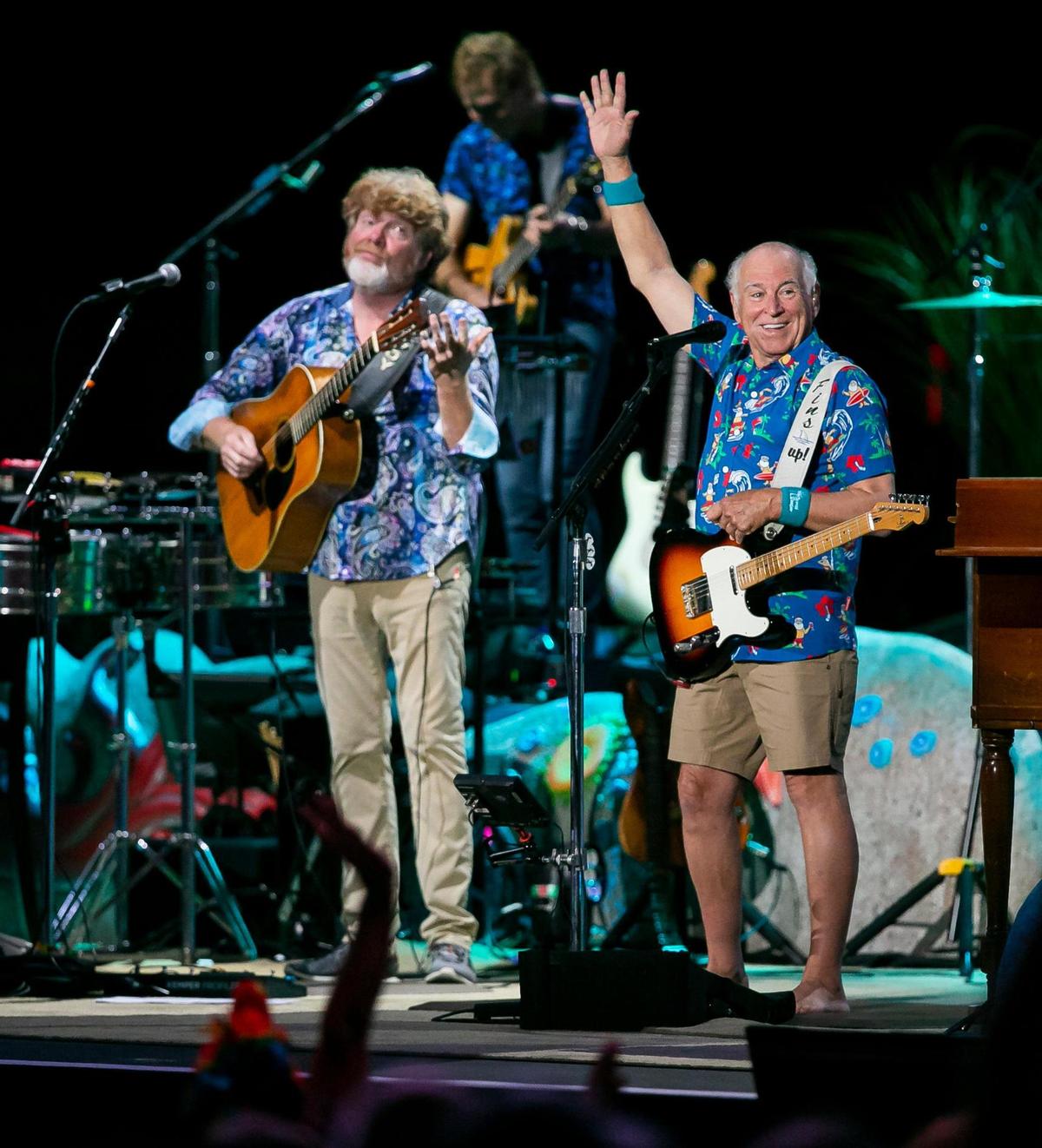 Jimmy Buffett and his Coral Reefer Band perform during their concert at the iTHINK Financial Amphitheatre in West Palm Beach, Florida, on Thursday, Dec. 9, 2021.