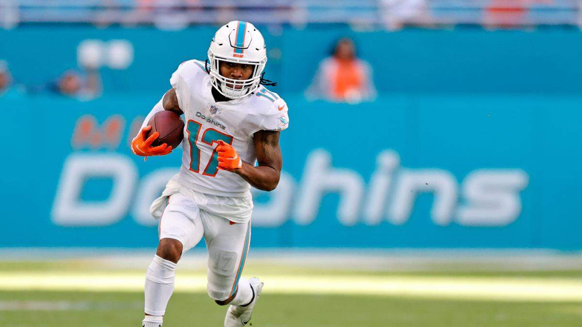 Miami Dolphins wide receiver Jaylen Waddle (17) runs with the football during fourth quarter of an NFL football game against the Houston Texans at Hard Rock Stadium on Sunday, November 7, 2021 in Miami Gardens, Florida.
